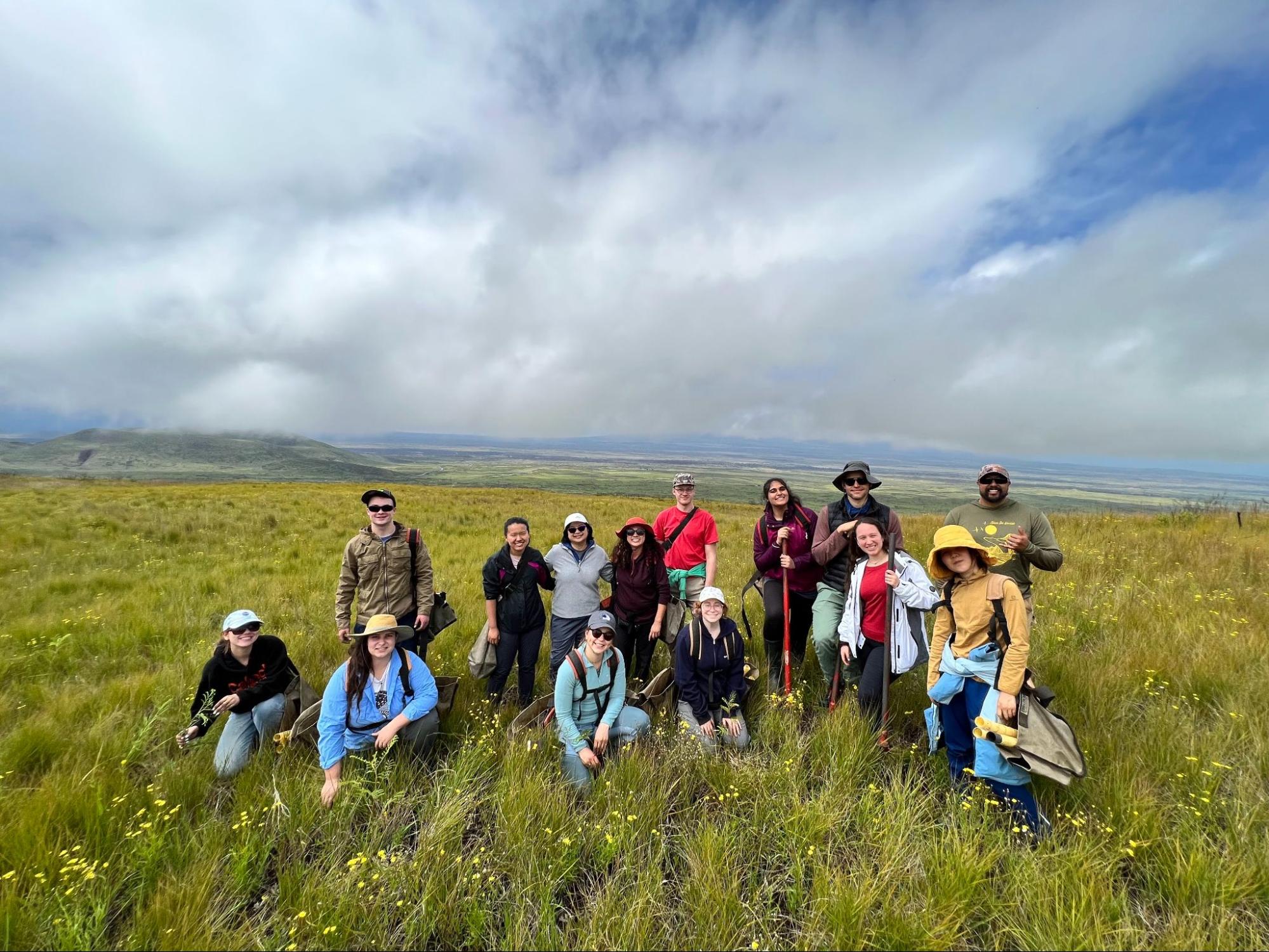 Caltech Y ASB group behind 2 of 400 newly planted native trees to help support the endemic and endangered Palila bird population