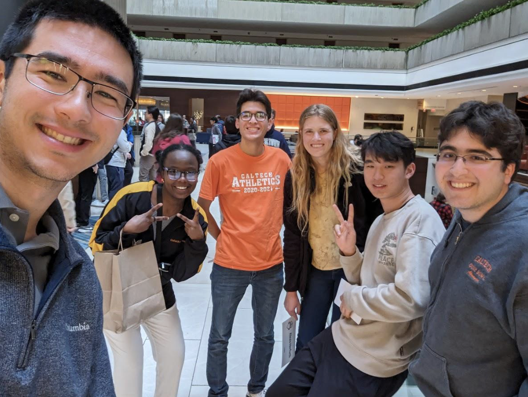 Picture of Caltech’s Quiz Bowl team smiling at the camera; names listed below