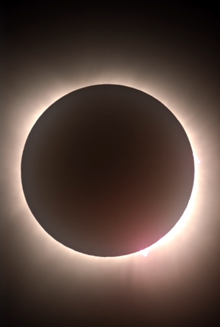 Picture of the eclipse (black circle with flare behind it)