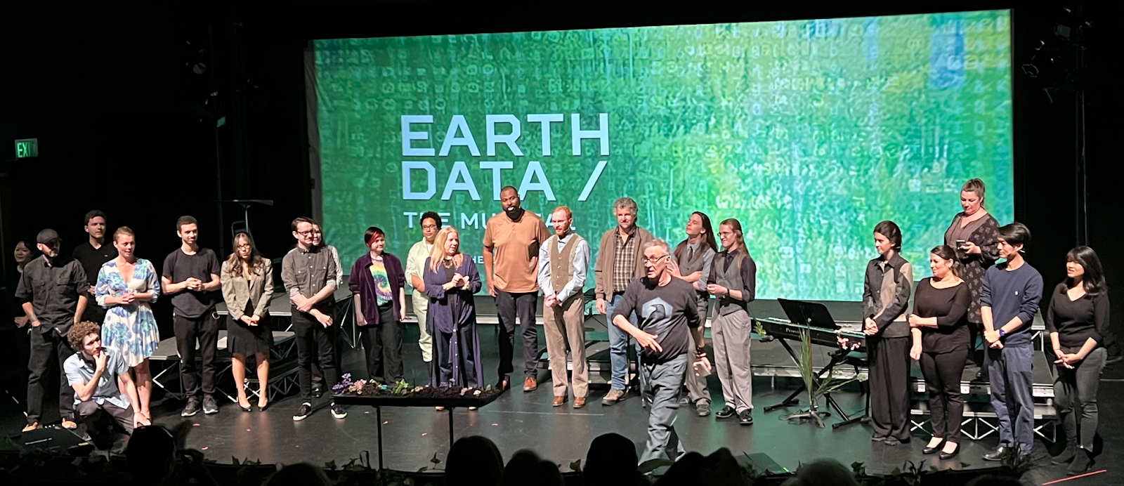 Picture of the cast and crew of Earth Data on stage