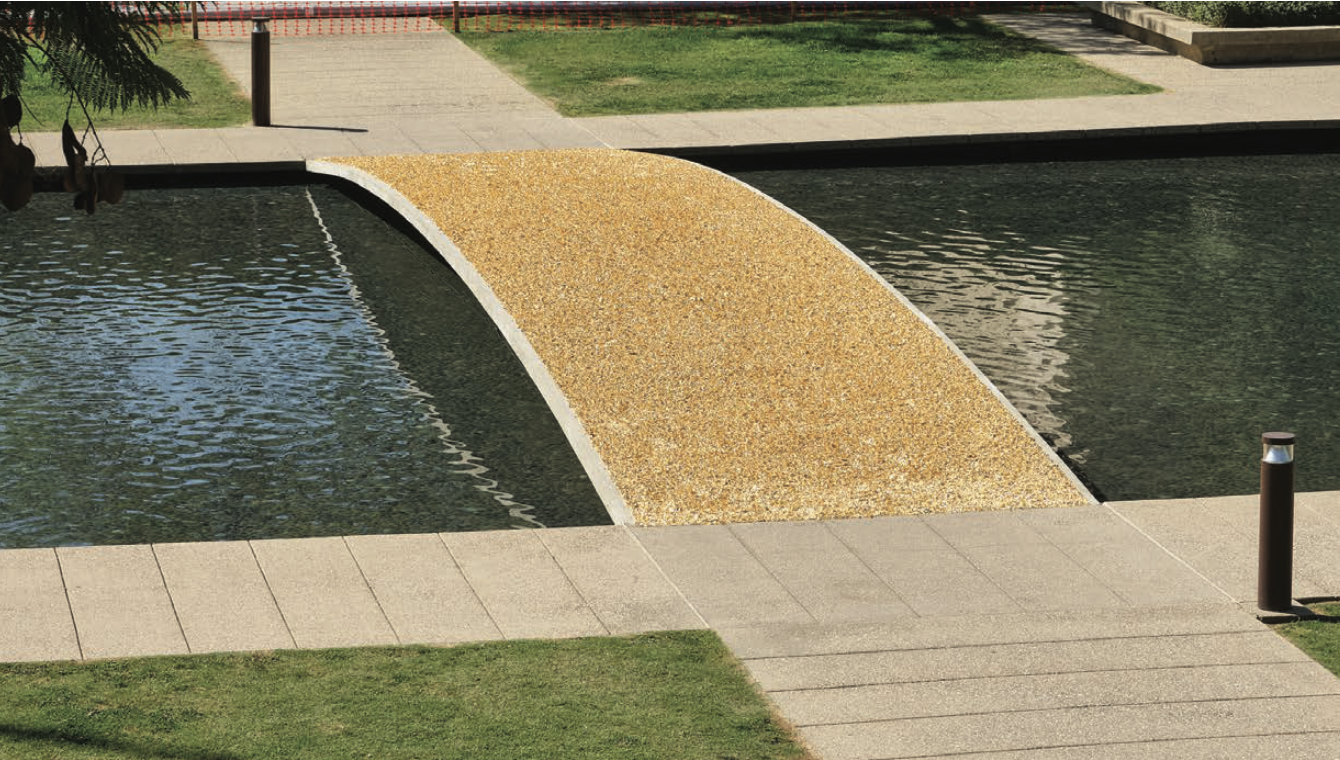 The bridge over the pond at Caltech Hall, currently covered in gold foil